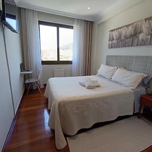 Kamer met een Queen Size Bed